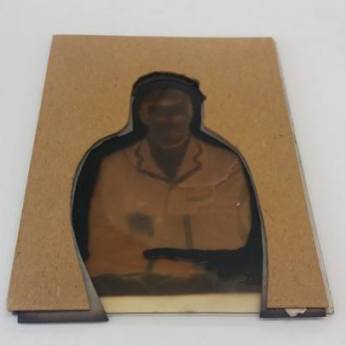 Fig 2: There was a cardboard adhered to this glass plate negative with black retouching paint around the edges. This would have been added to stop any of the background from being exposed.